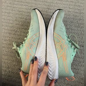 ASICS women’s Mint Green and Orange Athletic Shoes